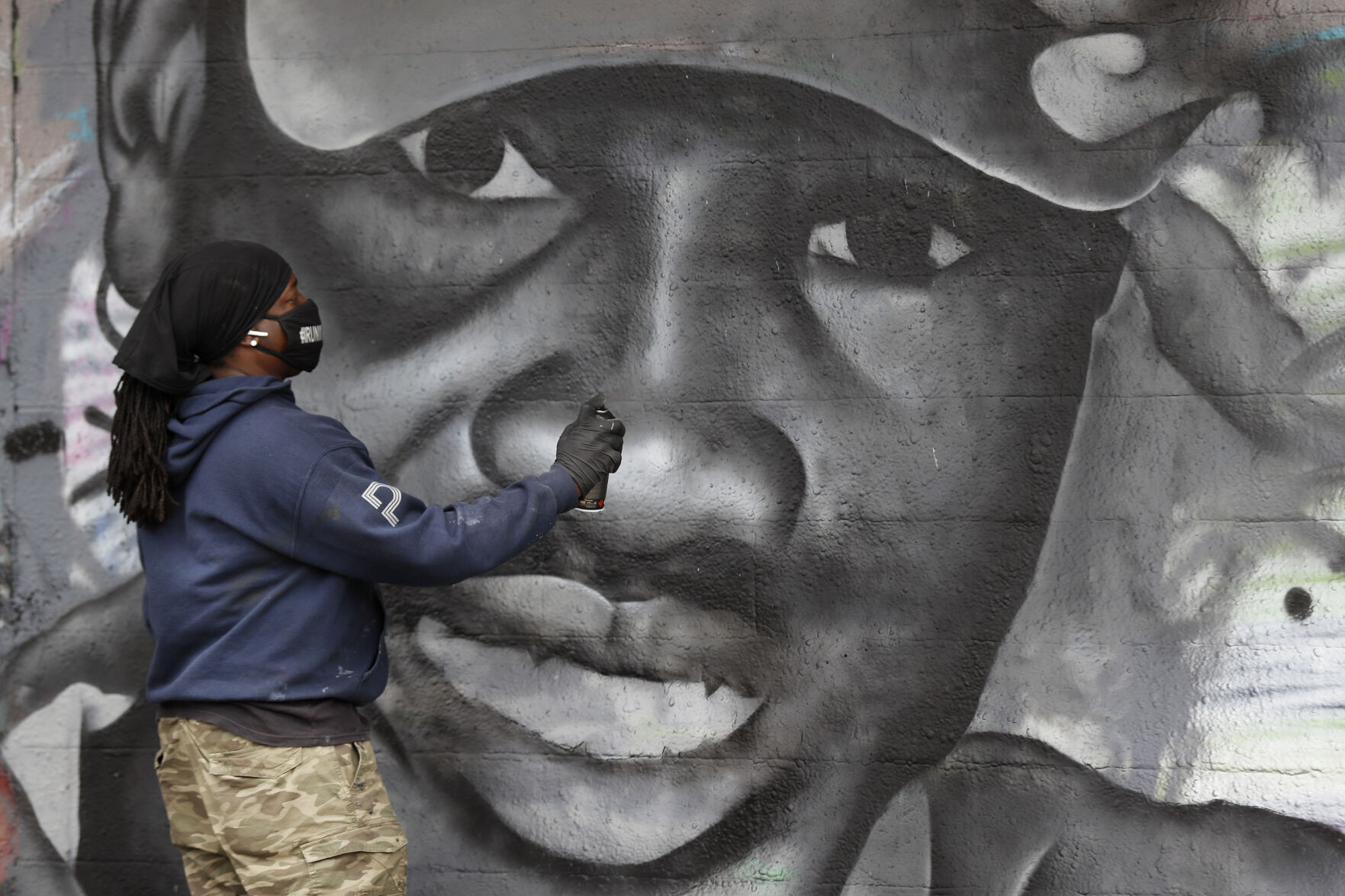 Virus Outbreak Texas Arbery Mural